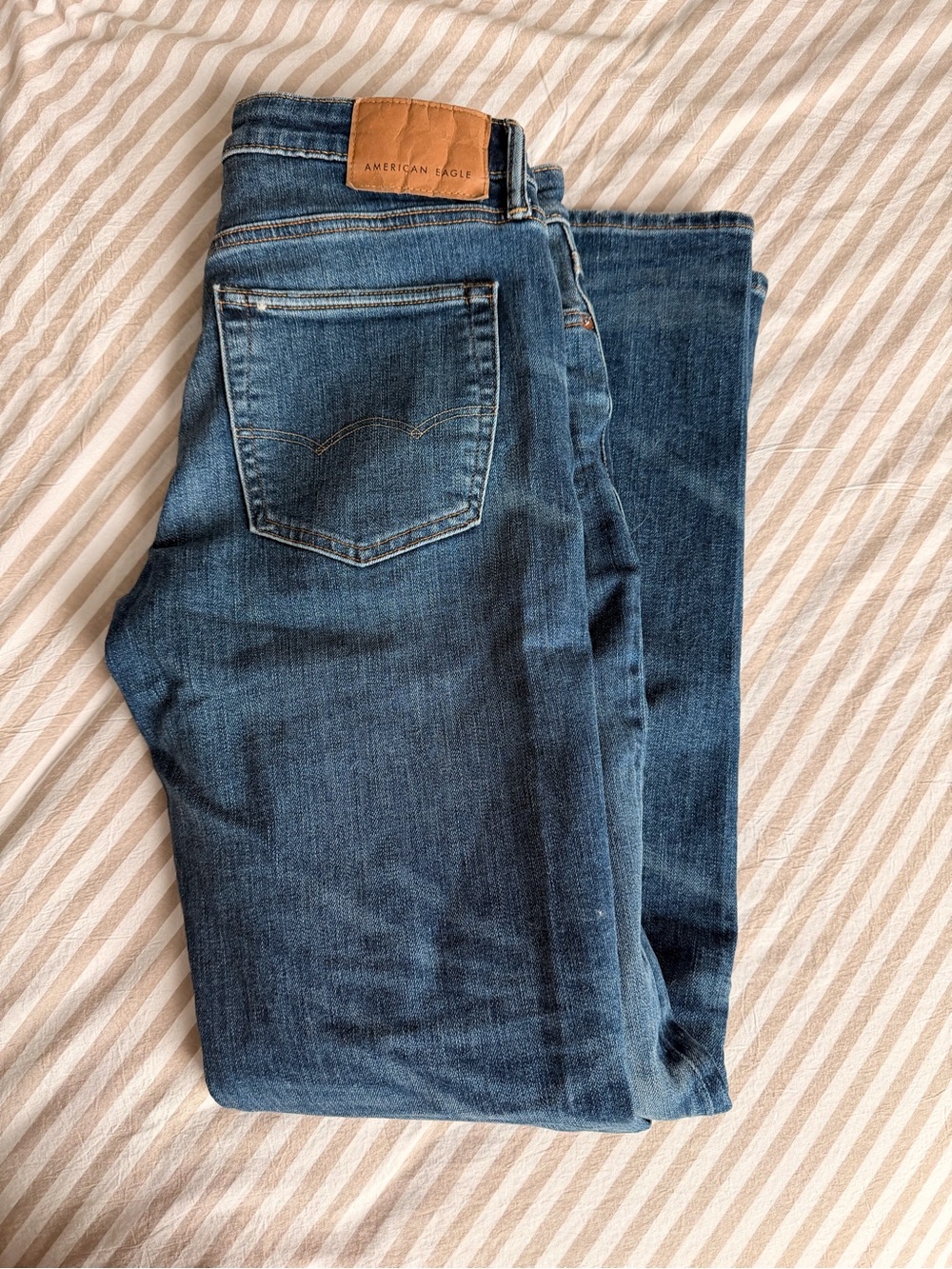 American Eagle Outfitters Men's Blue Slim Straight Jeans with Tan Leather Patch